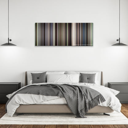 Witness color palette canvas above a bed, between two black pendant lamps