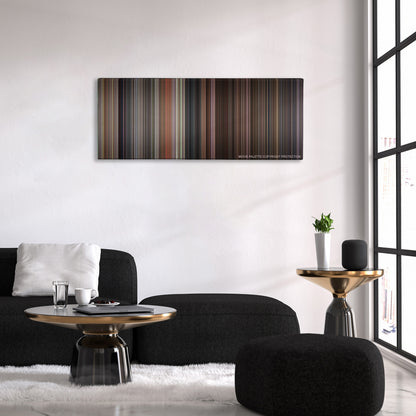 The Princess Bride color palette canvas above a black sofa with a gold-topped table