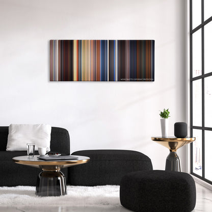 Out of Sight color palette canvas above a black sofa with a gold-topped table