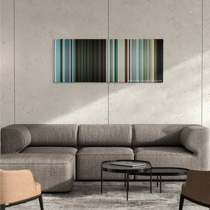 The Hitman's Bodyguard color palette canvas on a concrete wall above a gray sectional sofa