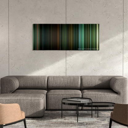 Overlord color palette canvas on a concrete wall above a gray sectional sofa
