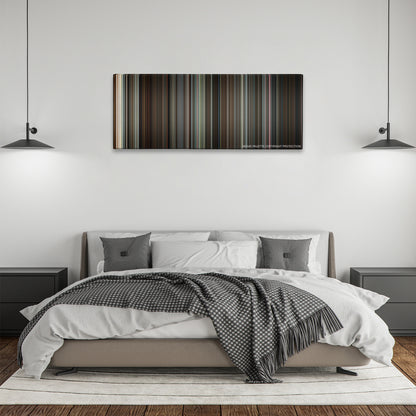 Valkyrie color palette canvas above a bed, between two black pendant lamps