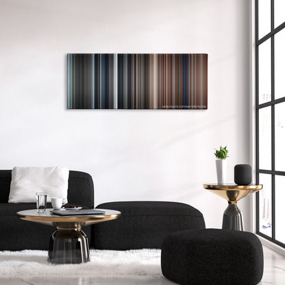 Here Comes the Boom color palette canvas above a black sofa with a gold-topped table