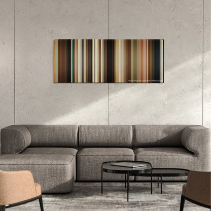 Palm Springs color palette canvas on a concrete wall above a gray sectional sofa
