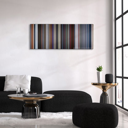 Tomorrowland color palette canvas above a black sofa with a gold-topped table