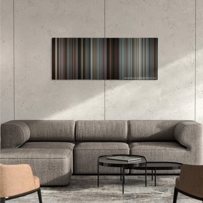 The Next Three Days color palette canvas on a concrete wall above a gray sectional sofa