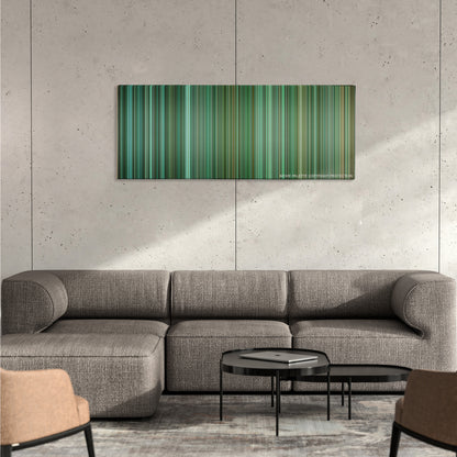 Unstoppable color palette canvas on a concrete wall above a gray sectional sofa