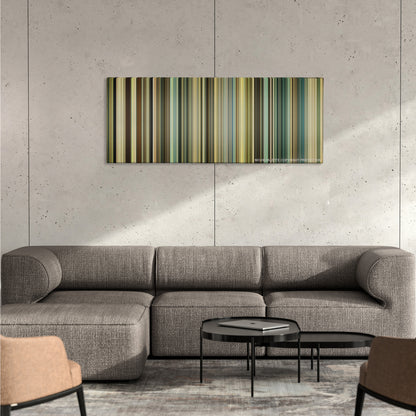 Taken 3 color palette canvas on a concrete wall above a gray sectional sofa