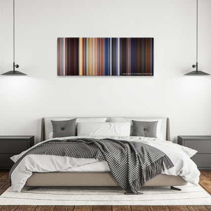 Out of Sight color palette canvas above a bed, between two black pendant lamps