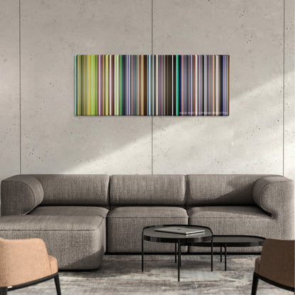 Elephant color palette canvas on a concrete wall above a gray sectional sofa