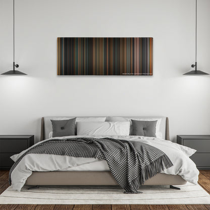 Identity color palette canvas above a bed, between two black pendant lamps