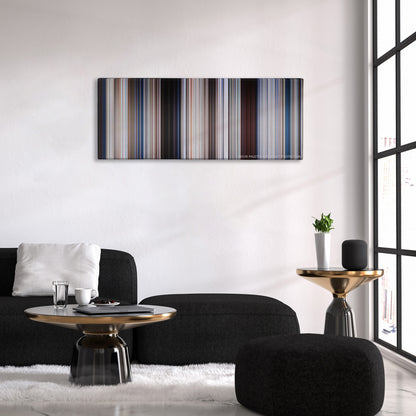 Jaws color palette canvas above a black sofa with a gold-topped table