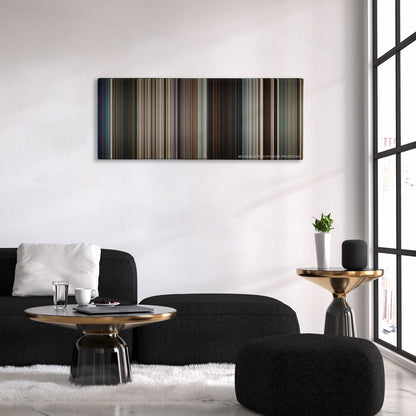 Logan color palette canvas above a black sofa with a gold-topped table