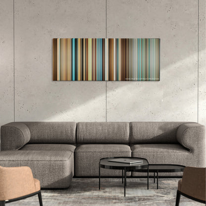Good Luck Chuck color palette canvas on a concrete wall above a gray sectional sofa