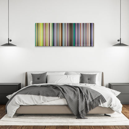 Elephant color palette canvas above a bed, between two black pendant lamps