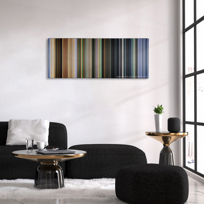 City of God color palette canvas above a black sofa with a gold-topped table