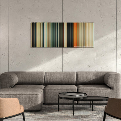 Wrath of the Titans color palette canvas on a concrete wall above a gray sectional sofa
