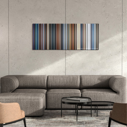 Hitman: Agent 47 color palette canvas on a concrete wall above a gray sectional sofa