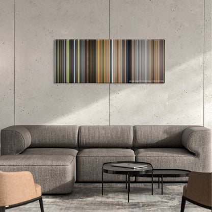 Turbo color palette canvas on a concrete wall above a gray sectional sofa