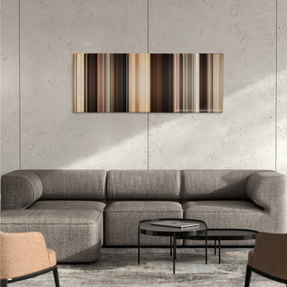 A Million Ways to Die in the West color palette canvas on a concrete wall above a gray sectional sofa