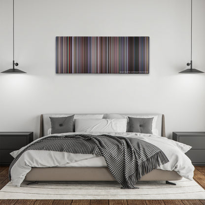 Amores Perros color palette canvas above a bed, between two black pendant lamps