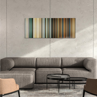 Wild Tales color palette canvas on a concrete wall above a gray sectional sofa