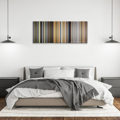 Turbo color palette canvas above a bed, between two black pendant lamps