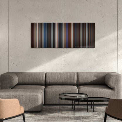 Basic Instinct color palette canvas on a concrete wall above a gray sectional sofa