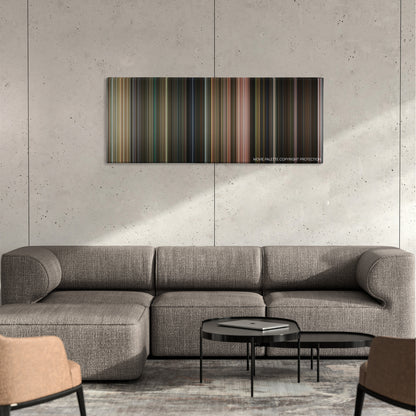 Flubber color palette canvas on a concrete wall above a gray sectional sofa