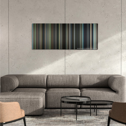 The Judge color palette canvas on a concrete wall above a gray sectional sofa