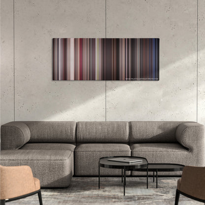 Cape Fear color palette canvas on a concrete wall above a gray sectional sofa