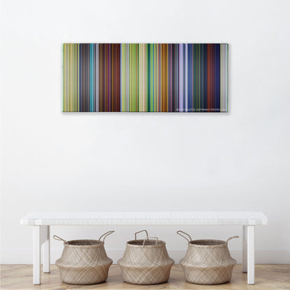 A Bug's Life color palette canvas above a white bench with three woven baskets