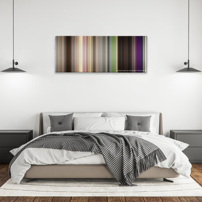 The DUFF color palette canvas above a bed, between two black pendant lamps