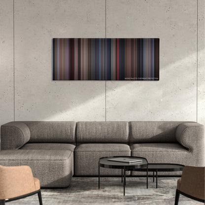 Videodrome color palette canvas on a concrete wall above a gray sectional sofa
