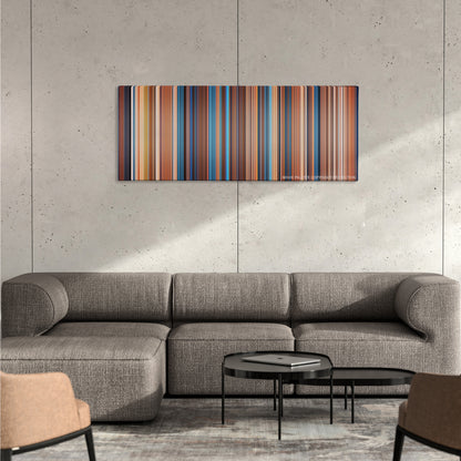 This Means War color palette canvas on a concrete wall above a gray sectional sofa