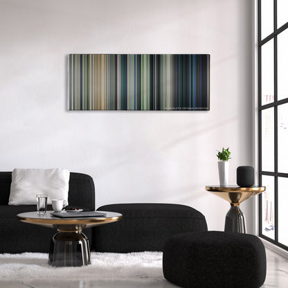 Jurassic World color palette canvas above a black sofa with a gold-topped table