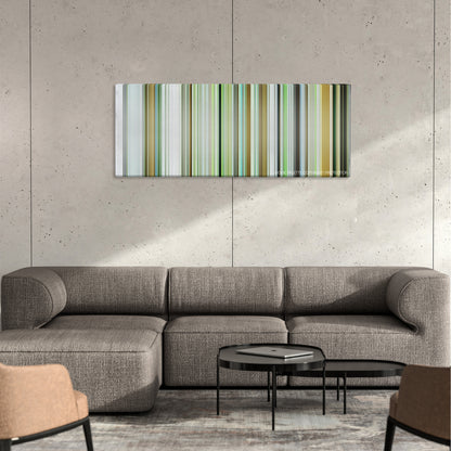 Dogtooth color palette canvas on a concrete wall above a gray sectional sofa