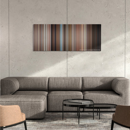 The Birds color palette canvas on a concrete wall above a gray sectional sofa