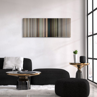 District 9 color palette canvas above a black sofa with a gold-topped table
