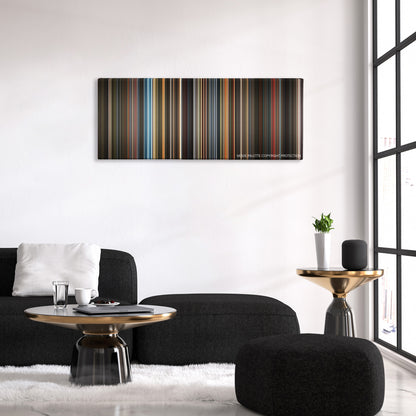 Confessions of a Dangerous Mind color palette canvas above a black sofa with a gold-topped table