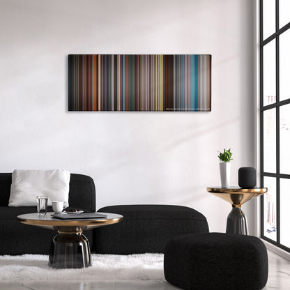 X-Men: First Class color palette canvas above a black sofa with a gold-topped table