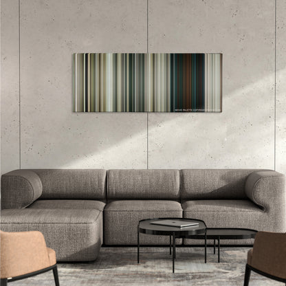 Battle Los Angeles color palette canvas on a concrete wall above a gray sectional sofa