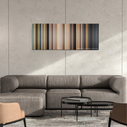 The Smurfs color palette canvas on a concrete wall above a gray sectional sofa