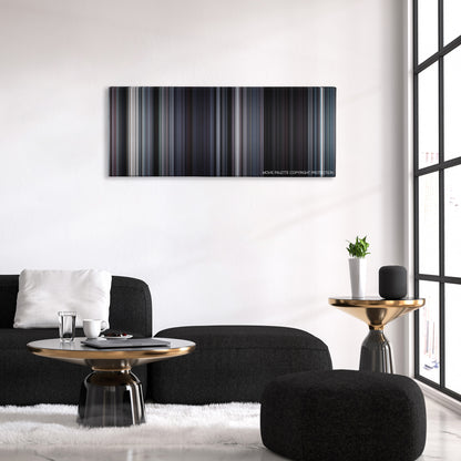 Martyrs color palette canvas above a black sofa with a gold-topped table