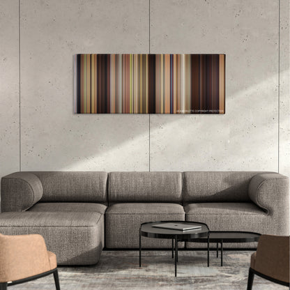 Sex Drive color palette canvas on a concrete wall above a gray sectional sofa
