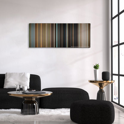 Rise of the Planet of Apes color palette canvas above a black sofa with a gold-topped table