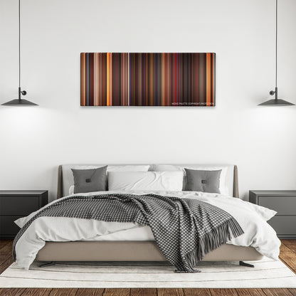 The Doors color palette canvas above a bed, between two black pendant lamps