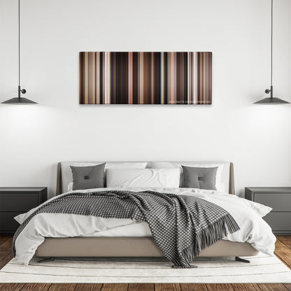 Stuck in Love. color palette canvas above a bed, between two black pendant lamps