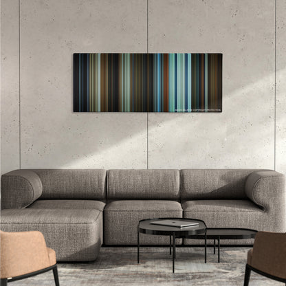 The Invisible Man color palette canvas on a concrete wall above a gray sectional sofa