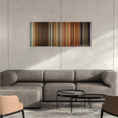 Zack and Miri Make a Porno color palette canvas on a concrete wall above a gray sectional sofa